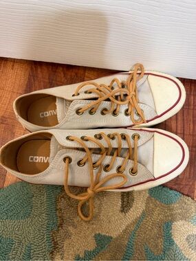Converse Low Top Canvas Sneakers in Tan with Red Trim